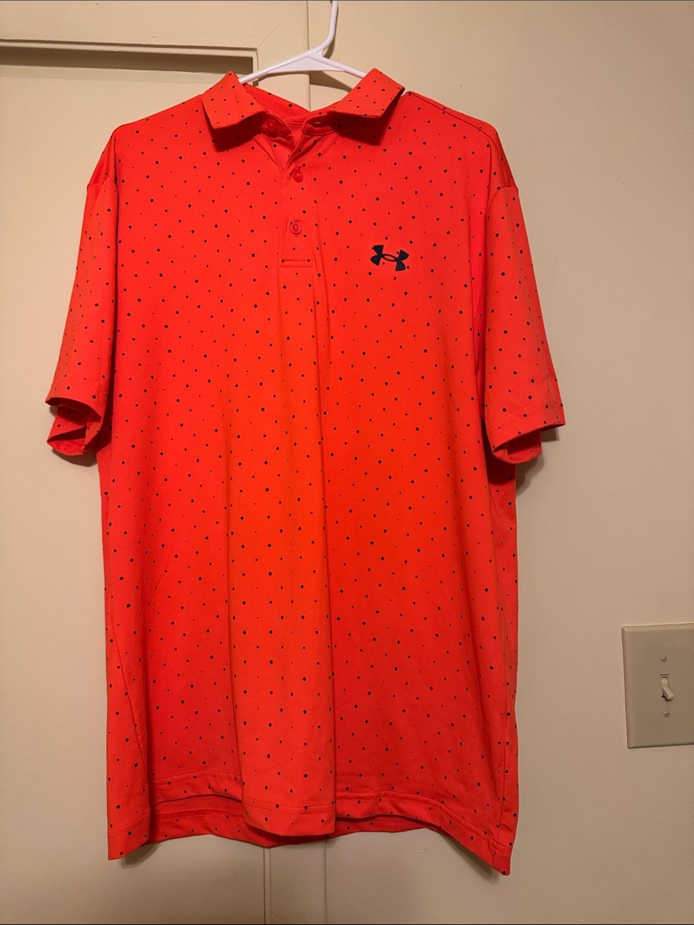 Under Armour Men’s Bright Orange Polo with Black Print